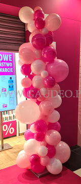 Balony o różnych wielkościach ułożone w kolumnę.